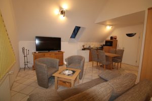 Wohnzimmer mit Küche