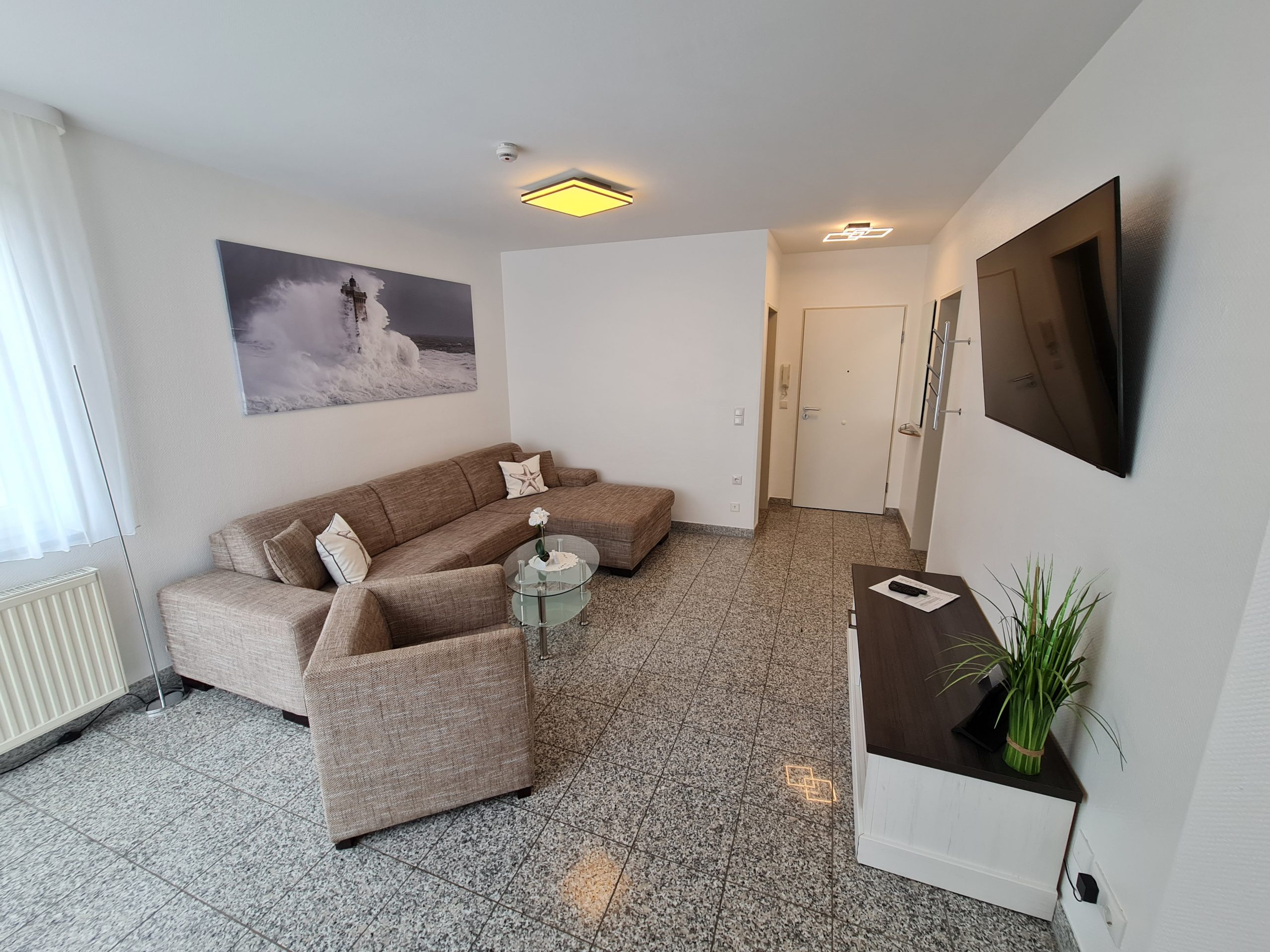 Wohnzimmer mit Balkon